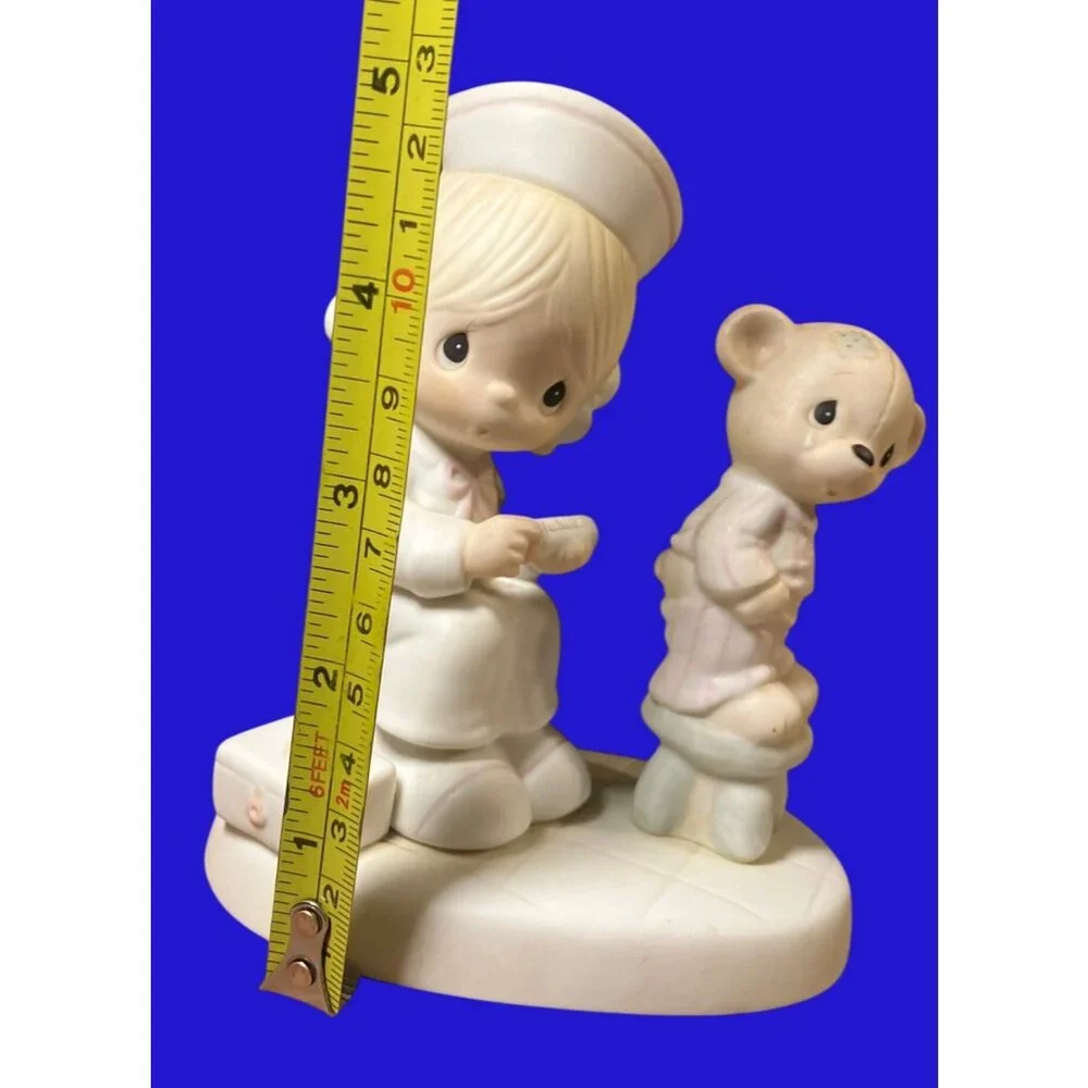 Precious Moments Love Beareth All Things Figurine E-7158 Nurse and Bear
